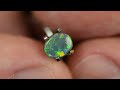 0.68 ct natural solid black opal gemstone video opalfirst.com australia