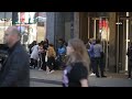 Migrants outside The Row hotel in NYC as Trump's 