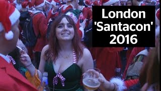 Hundreds of people dress as Santa Claus for annual London Santacon