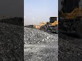 sdlg matadors wheel loader action pushing rock.