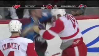 Aaron Downey introduces himself to Ian Laperrière after the cheap shot on Lidstrom