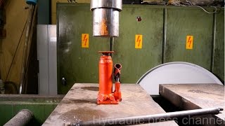 Crushing bottle jack and blast shield with hydraulic press