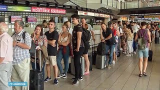 Honderden vakanties gestrand op Schiphol door storing - RTL NIEUWS