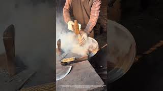 Traditional Axe Handle Installation: Combining Metal and Wood