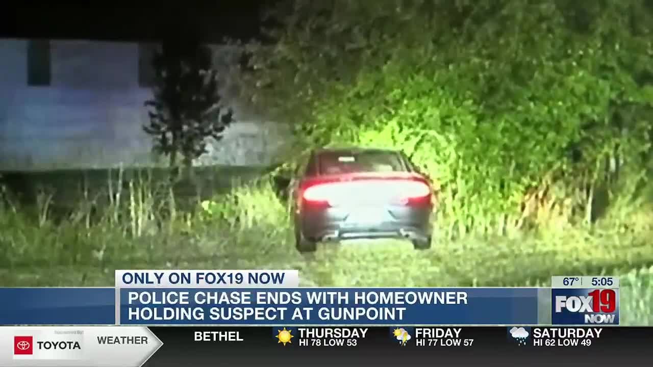 WATCH: Police Chase Ends With Homeowner Holding Suspect At Gunpoint ...