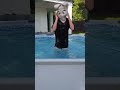 Funny bunny swims in the pool, Tutudog