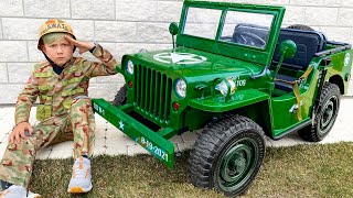 Senya Unboxing a new military Power Wheels Car
