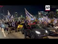 Protesters block Tel Aviv highway as PM sacks defense minister