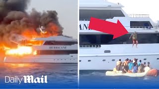 Shocking moment man jumps from Egypt tour boat engulfed in flames