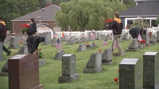 Volunteers decorate veteran graves at Verona-Oakmont Cemetery