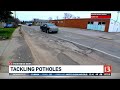 Do these Indy potholes look 'fixed' to you?