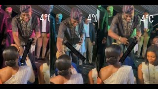 Moment K1 De Ultimate pauses his performance to spray bride bundle of cash at recent event