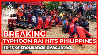 Mass evacuations as super Typhoon Rai slams into Philippines