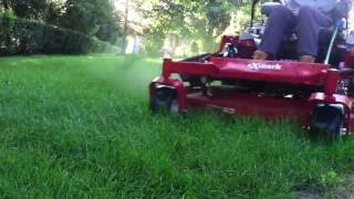 lawn mowing with Exmark Lazer z 60''