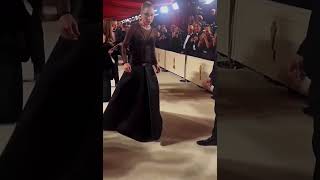 Lady Gaga turned around to help the photographer on the Oscars red carpet
