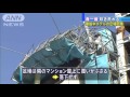 “春一番”吹き荒れる中　建設中ホテルの足場倒壊 16 02 14