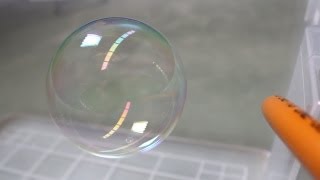 Soap Bubbles Floating on Butane