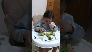 Baby eating broccoli 🥦