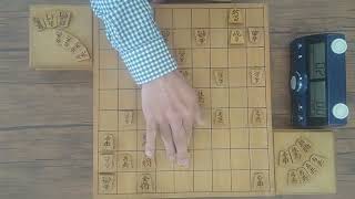 第7回一手20秒将棋５番勝負第4局　（先手、手前）四段　東畑直希（居飛車～穴熊）　対　（先手、奥）五段　門屋良和（ノーマル中飛車～早囲い～銀冠）令和5年5月25日（木）宇都宮市