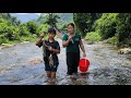 How a 35-year-old single mother and her son catch fish the traditional way