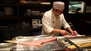 Preparing yellowtail sashimi at Nobu Budapest