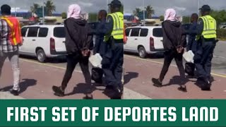 First SET of DEPORTES just LANDED in JAMAICA,  most of them in police custody