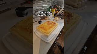 using blow torch on cake