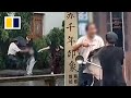 Passers-by fend off knife-wielding man in China