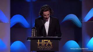 Timothée Chalamet accepts the Breakout Actor award at the Hollywood Film Awards