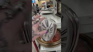 Savers, Dali  style, melting clock