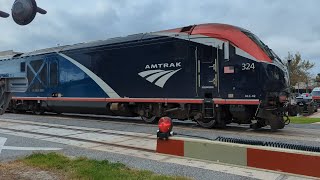 The Silver Meteor (Amtrak Train 98) in Kissimmee, FL plus SunRail commuter train (2024-11-20)