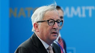 Juncker seen stumbling before NATO gala dinner, leaders step in to help