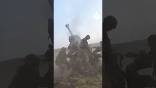 Ukrainian artillery fire howitzers at Russian targets on the Kherson frontline