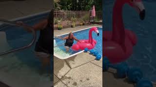 Woman is trying her best to get on a pool float, and it doesn't go well...