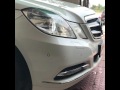 Mercedes benz E-class headlight washer in slow motion