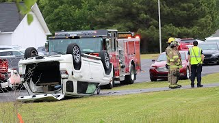 Vehicle flips in front of Funeral Home on Shorter Avenue