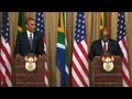 Obama praises Mandela's courage in S. Africa