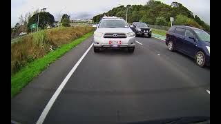 Old man angry about being prevented from cutting ahead in traffic.