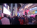 Times Square Night Walk: New York City's Dazzling Lights.