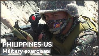 Filipino and American soldiers participate in military exercises