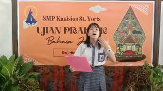 Maca Geguritan Kanthi Irah-irahan Guru dening Alyen siswa SMP Kanisius St.Yoris