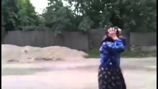 ROMANIAN GRANNY GETS HIT BY A BAT ! FUNNY