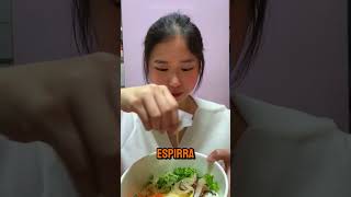 Tasting the Korean stir fry. Priscila Ju