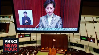 News Wrap: Hong Kong's leader says law criminalizing dissent has brought stability