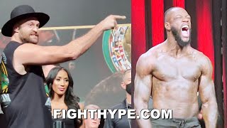TYSON FURY & DEONTAY WILDER ERUPT AGAIN; GO AT IT & TRADE HEATED WORDS FROM A DISTANCE