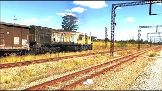 Battered GT22CL-2 1040 Takes off With Empty Clinker Wagons For Bulawayo