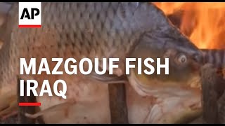 Grilled fish cooked around large open fires is a popular dish in Baghdad.