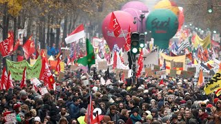 Across France, hundreds of thousands protest pension reform on day one of strike