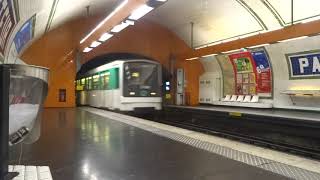 Paris Metro Line M12 train arriving at Pasteur