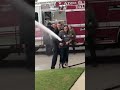 firefighter s family uses hose to reveal baby s gender 1037980